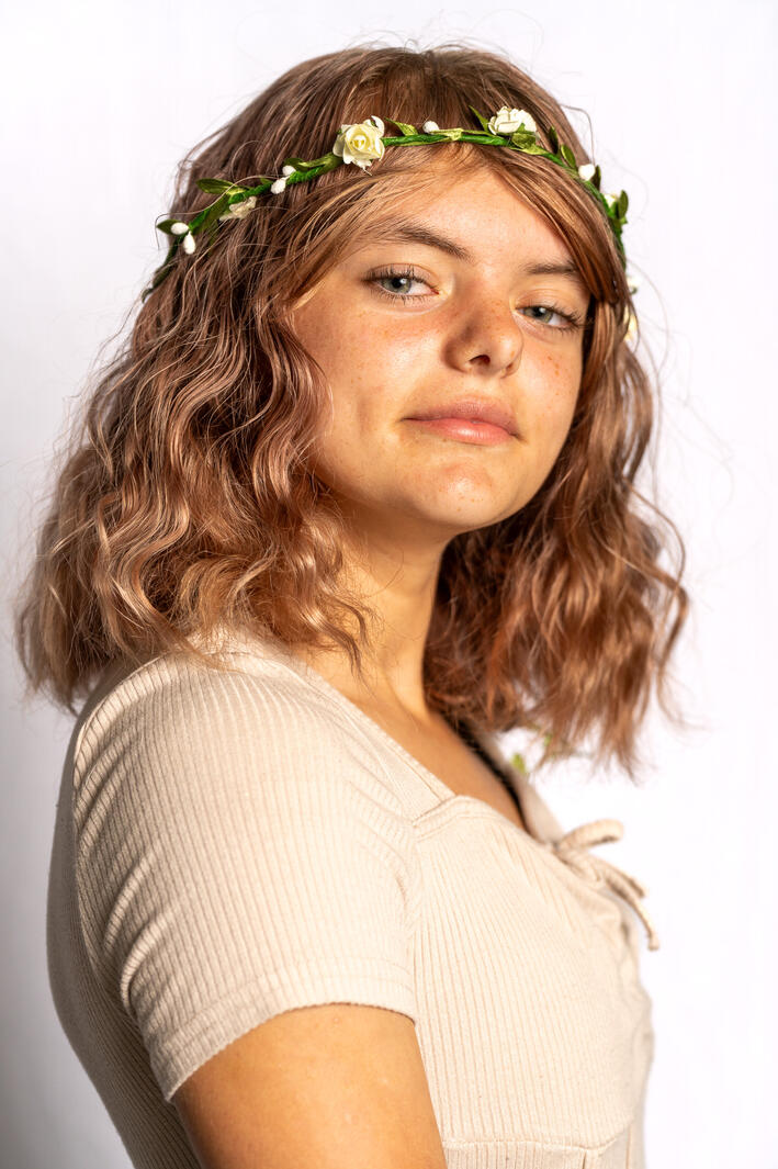 teen headshot on white background